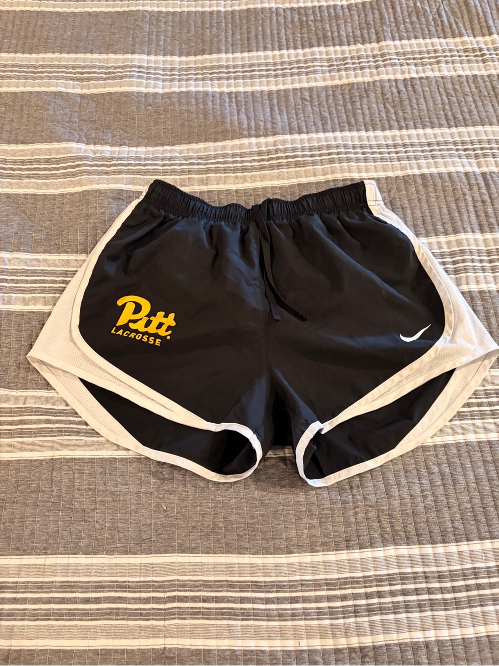 Nike Women’s medium Black Athletic Shorts with White Trim and Yellow Pitt Logo